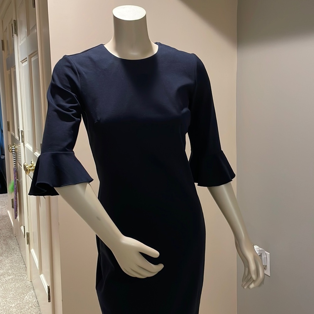 Classic, pretty, flattering navy blue dress w/ ruffle detail